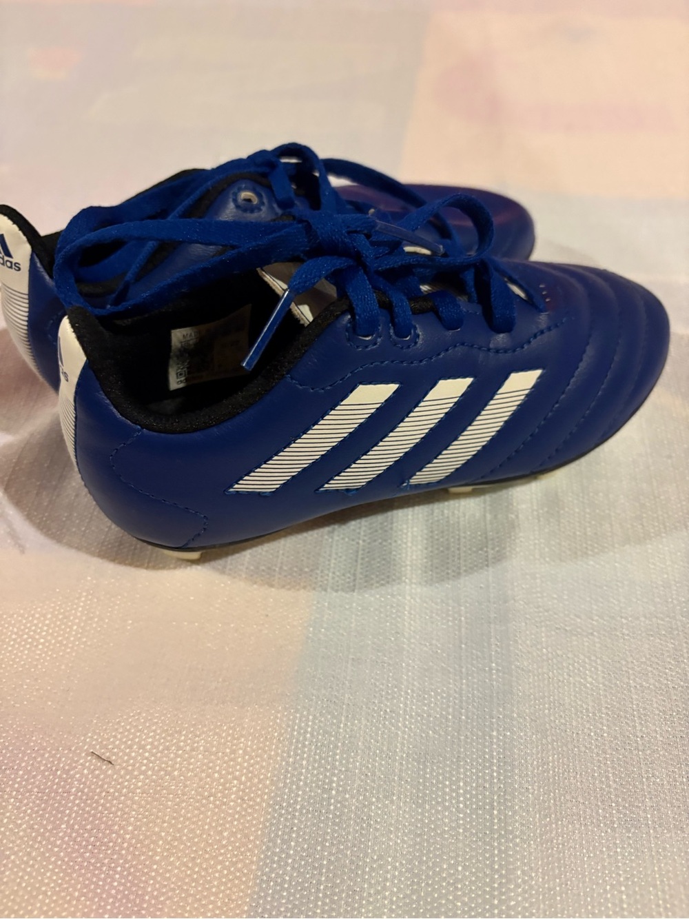 Blue adidas cleats size 10